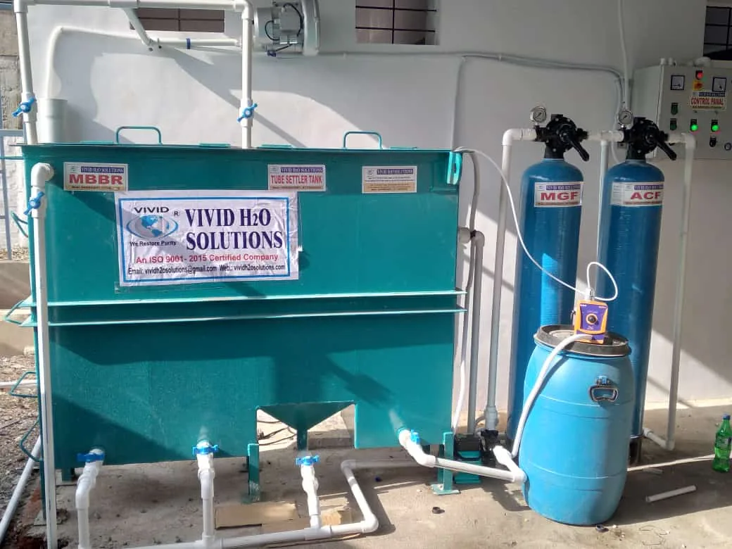 Field installation of an epoxy-coated mild steel package STP with tube settler hopper, filtration vessels, and dosing pump